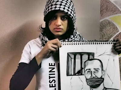 Shahd Abusalama with her drawing of Samer Issawi